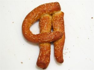 pretzel shaped as a reverse P, the pilcrow paragraph mark